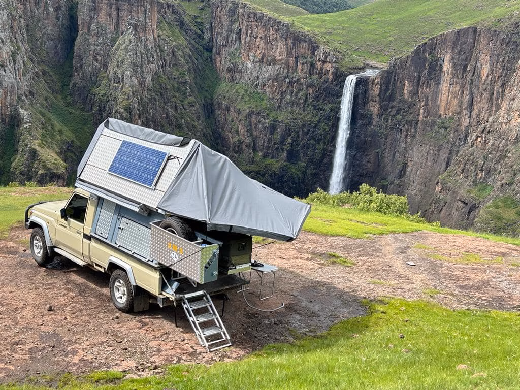 AHA Transformer on a Land Cruiser single cab. Set up for camp next to a waterfall in Lesotho.