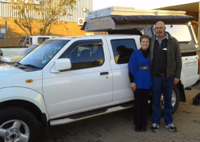 Arrie and Wilma Van Wyk with their AHA-45 on a Nissan Navara Double Cab, collected at the AHA Outdoor Systems factory, 2013.