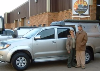 Bill Wallace with their AHA-45 on a Toyota Hilux Double Cab, collected at the AHA Outdoor Systems factory.