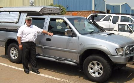 Brian Hunt with their AHA-45 on a Double Cab, collected at the AHA Outdoor Systems factory, 2011.