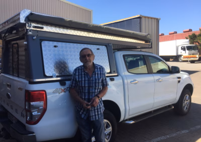 Daan and Melanie Van Der Merwe with their AHA Transformer on a Ford Ranger Double Cab, collected at the AHA Outdoor Systems factory, 2018.