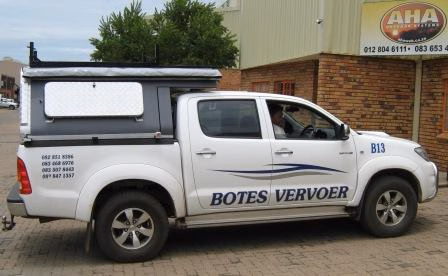 DCG and Miet Botes with their AHA-45 on a Toyota Double Cab, collected at the AHA Outdoor Systems factory, 2011.