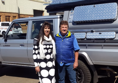 Deon and Martie Kaps with their AHA-45 on a Toyota Land Cruiser Double Cab, collected at the AHA Outdoor Systems factory, 2015.