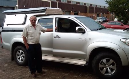 Dikie and Ann Schoeman with their AHA-45 on a Toyota Double Cab, collected at the AHA Outdoor Systems factory, 2011.