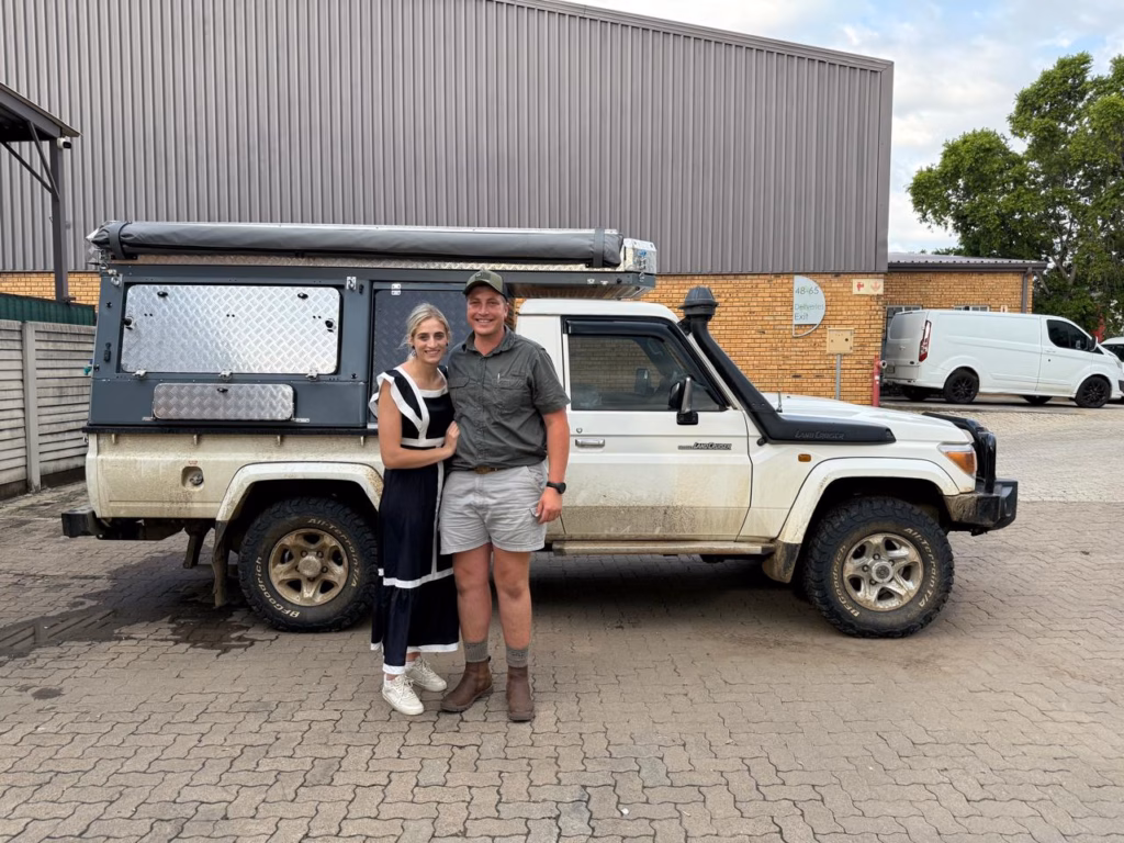 Drian & Fieta De Lange | Toyota Land Cruiser Single Cab | Frankfort, Free State Drian and Fieta De Lange with their AHA Transformer on a Toyota Land Cruiser Single Cab, collected at the AHA Outdoor Systems factory, 2025.