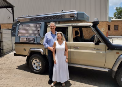 Dries and Barbara Reynecke with their AHA Transformer on a Toyota Land Cruiser Double Cab, collected at the AHA Outdoor Systems factory, 2020.