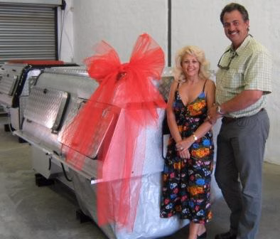 Dries and Barbara Reyneke with their AHA-45 on a Toyota Land Cruiser Double Cab, collected at the AHA Outdoor Systems factory, 2011.
