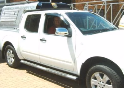 Dries and Karin Botha with their AHA-45 on a Nissan Navara Double Cab, collected at the AHA Outdoor Systems factory.