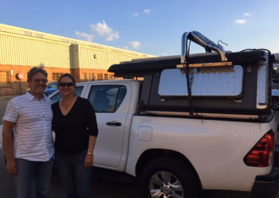 Emma Hansen with their AHA Transformer on a Toyota Hilux Double Cab, collected at the AHA Outdoor Systems factory, 2019.