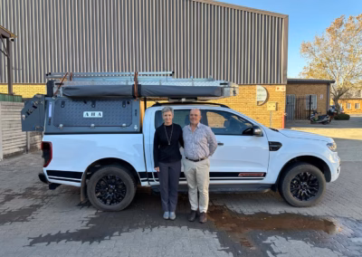 Gerrit Van Schalkwyk with their AHA Transformer on a Ford Ranger Double Cab, collected at the AHA Outdoor Systems factory, 2024.
