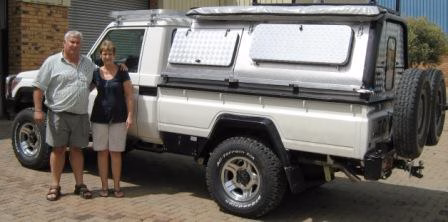Harry and Daleen Pohl with their AHA-45 on a Toyota Land Cruiser Single Cab, collected at the AHA Outdoor Systems factory, 2011.