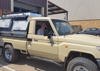 Hugo Meyer with their AHA-45 on a Toyota Land Cruiser Single Cab, collected at the AHA Outdoor Systems factory, 2014.