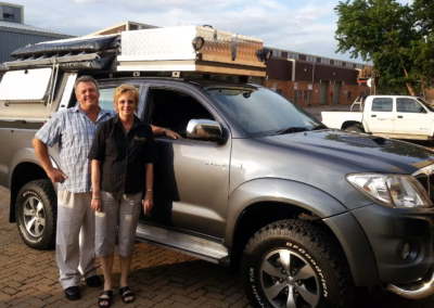 Johan Venter with their AHA-45 on a Toyota Double Cab, collected at the AHA Outdoor Systems factory, 2012.