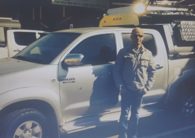 Johan Vorster with their AHA-45 on a Toyota Double Cab, collected at the AHA Outdoor Systems factory, 2014.