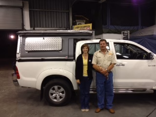 Johnny and Joyce Olivier with their AHA-45 on a Toyota Double Cab, collected at the AHA Outdoor Systems factory, 2012.