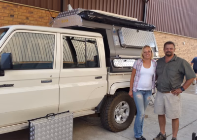 Koos Van Der Merwe with their AHA-45 on a Toyota Land Cruiser Double Cab, collected at the AHA Outdoor Systems factory, 2015.