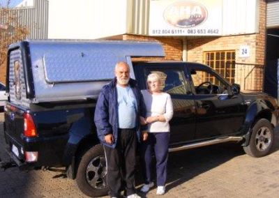 Louis and Tokie Van Den Berg with their AHA-45 on a Tata Zenon Double Cab, collected at the AHA Outdoor Systems factory, 2011.
