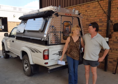 Malinda Botha with their AHA-45 on a Toyota Hilux Single Cab, collected at the AHA Outdoor Systems factory, 2016.