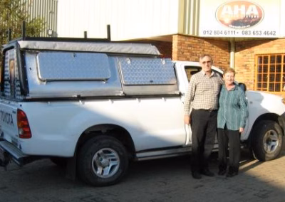 Martin and Annetjie Krugel with their AHA-45 on a Toyota Single Cab, collected at the AHA Outdoor Systems factory, 2011.