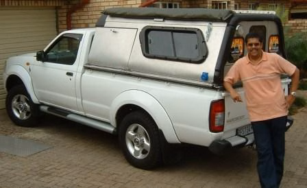 Mervin Johnstone with their AHA-45 on a Nissan Np 300 Single Cab, collected at the AHA Outdoor Systems factory.