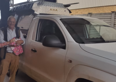 Mike and Christine Hodge with their AHA-45 on a Volkswagen Amarok Single Cab, collected at the AHA Outdoor Systems factory, 2014.
