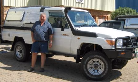 Otto Hayes with their AHA-45 on a Toyota Land Cruiser Single Cab, collected at the AHA Outdoor Systems factory, 2010.