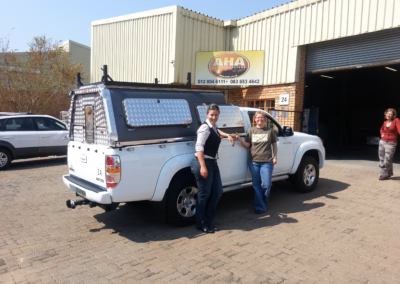 Renita Du Plooy with their AHA-45 on a Single Cab, collected at the AHA Outdoor Systems factory, 2012.