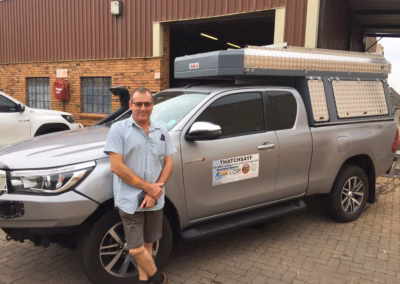 Richard Wilson with their AHA Transformer on a Toyota Hilux Extra Cab, collected at the AHA Outdoor Systems factory, 2019.
