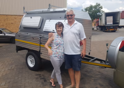Theo and Jeanette Geldenhuys with their AHA Transformer on a Trailer, collected at the AHA Outdoor Systems factory, 2017.