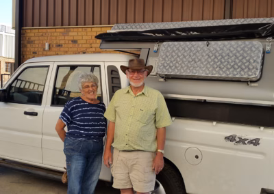Willie and Tilla Van Biljon with their AHA-45 on a Mahindra Double Cab, collected at the AHA Outdoor Systems factory, 2014.