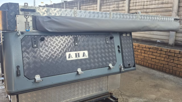 Right hand kitchen compartment on the outside of a pre-owned 2024 AHA Transformer.