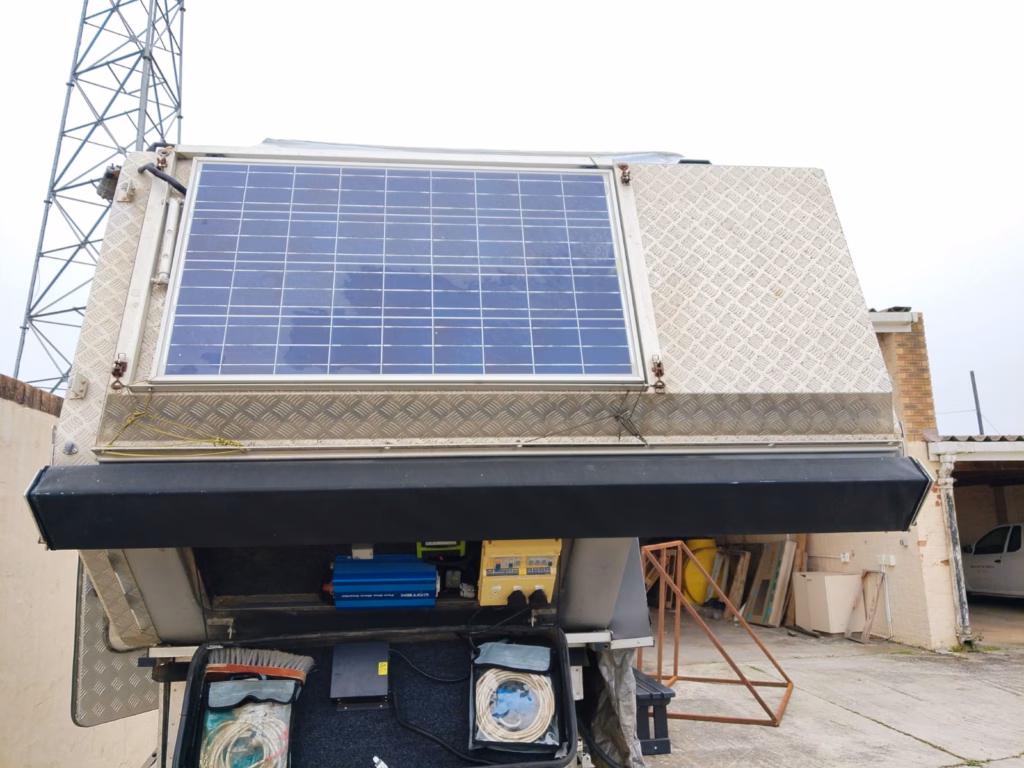 Sun panel of 100 watt on a pre-owned 2015 AHA-45, with the awning out.