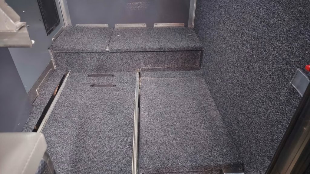 Floor inside a pre-owned 2024 AHA Transformer, with the hatches closed.