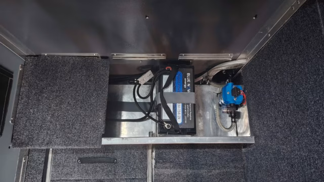 The battery box inside an AHA Transformer, which also forms the step up to the bed.