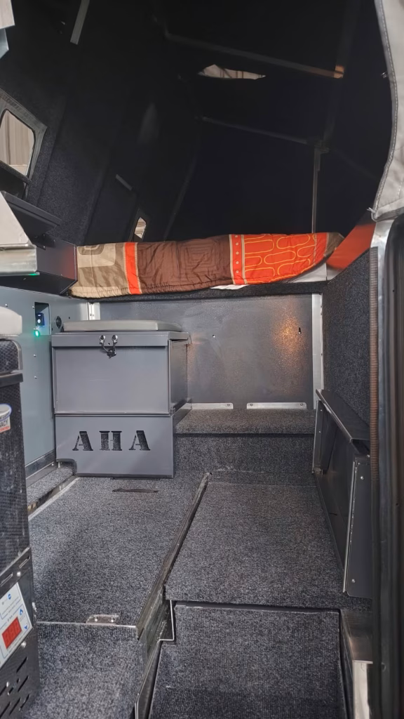 Toilet box storage inside a pre-owned 2024 AHA Transformer.