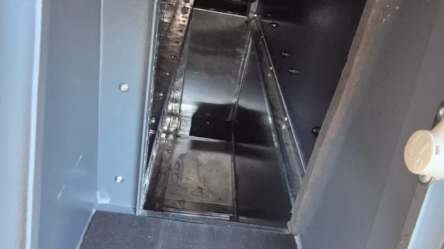 Interior open with the floor lifted, showing the storage beneath.