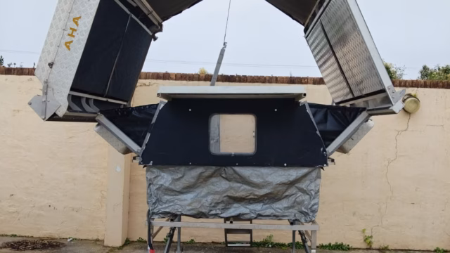 Front of a pre-owned 2015 AHA-45 standing open on its slide-on frame.