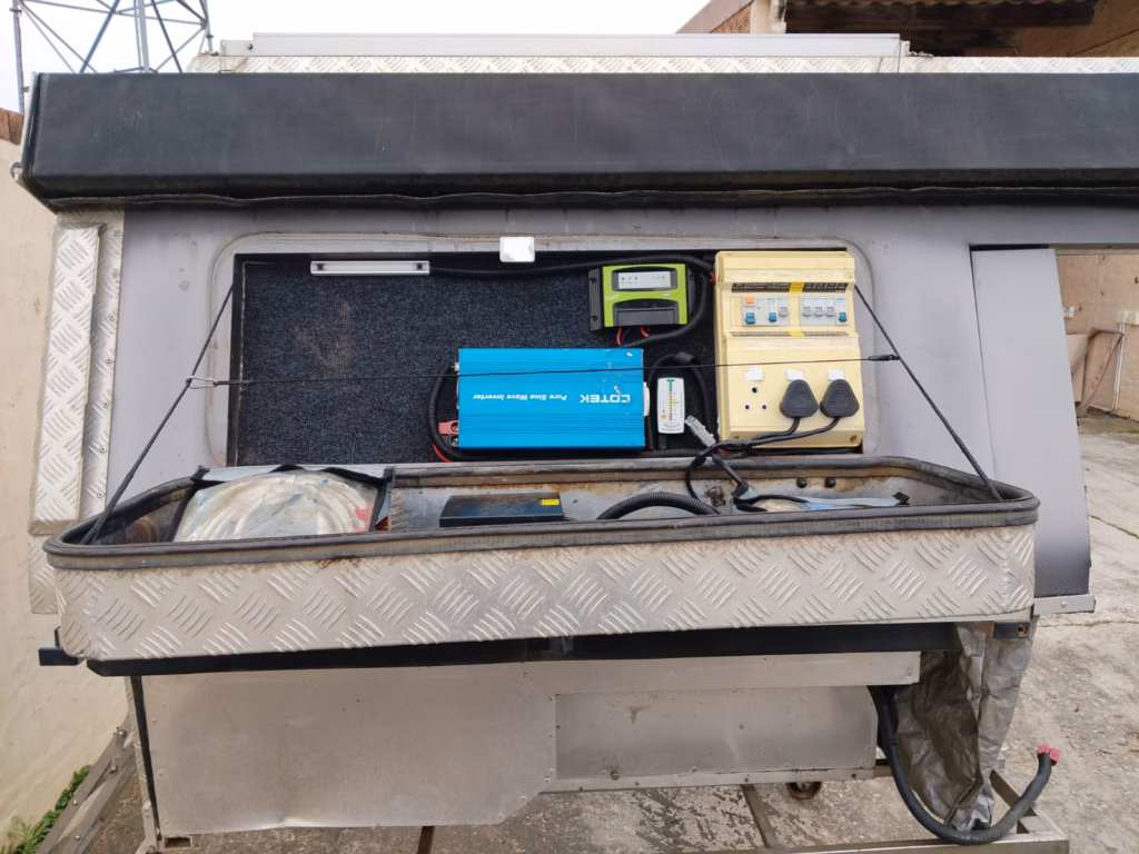 Electrical compartment of a pre-owned 2015 AHA-45, with the switchboard and plugs.