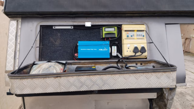 Electrical compartment of a pre-owned 2015 AHA-45, with the switchboard and plugs.