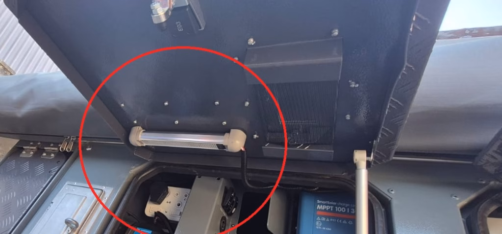 Light in the outside left hand electrical area of a 2024 AHA Transformer.