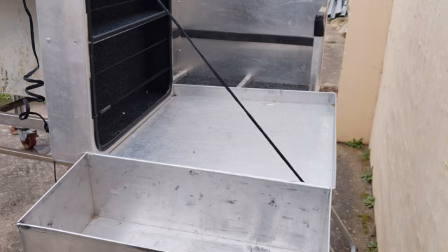 Kitchen compartment of a pre-owned 2015 AHA-45, opening to the outside.