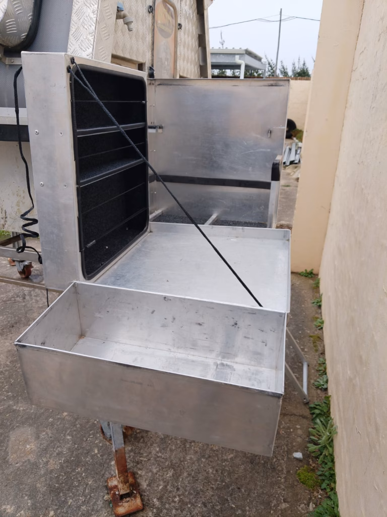 Kitchen compartment of a pre-owned 2015 AHA-45, opening to the outside.