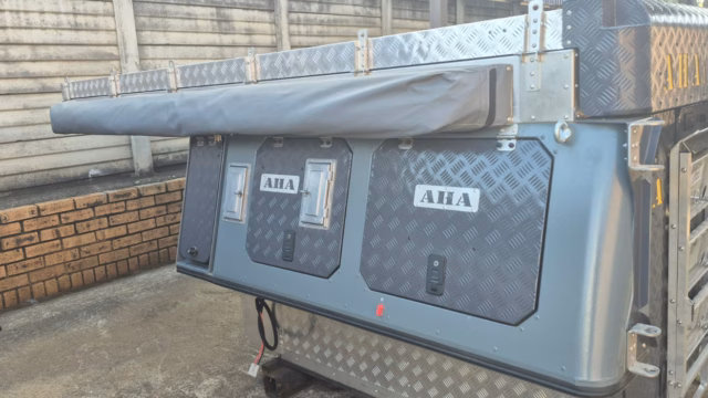 Outside left hand electrical and gas compartment of a 2024 AHA Transformer.