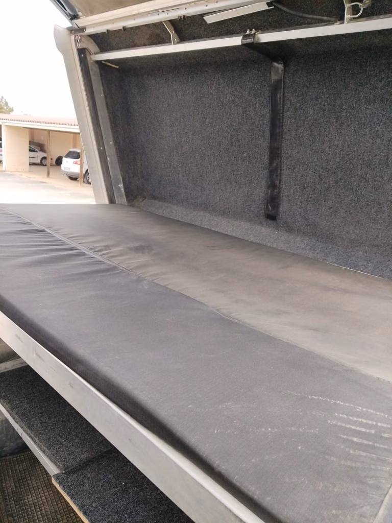 Second view of the beds in a pre-owned 2015 AHA-45, showing the single bed.