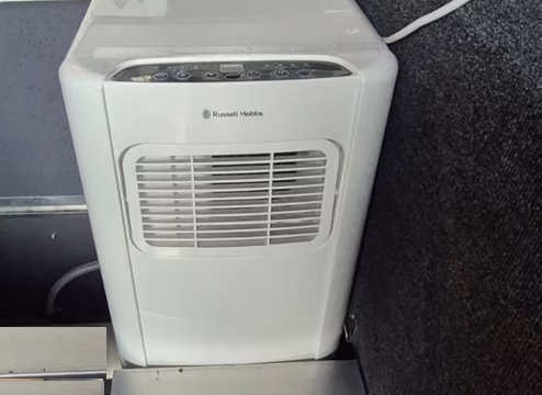 Russell Hobbs mobile air conditioner supplied with a pre-owned 2023 AHA Transformer.