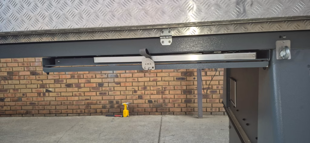 Outside table with its mounting bracket, 1 000mm by 500mm.