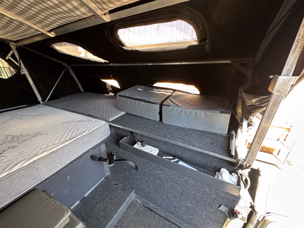 Storage space for the two canvas clothing bags inside a 2025 AHA Transformer.