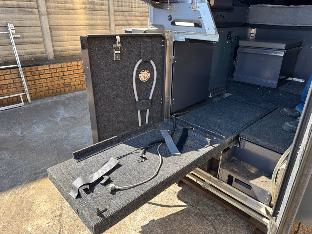 Fridge slider system, reachable from inside and from outside the unit.
