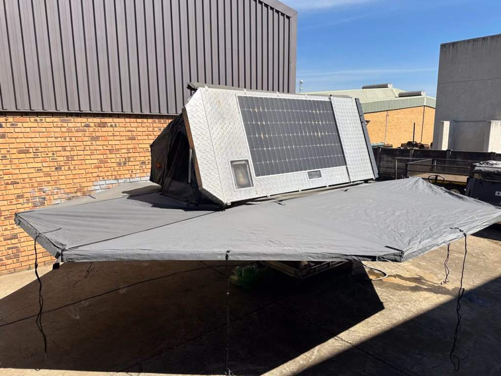 Right hand side awning extended over the kitchen of the Transformer.